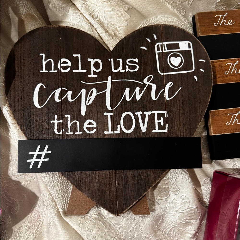 Heart-Shaped Wooden Sign with White Text